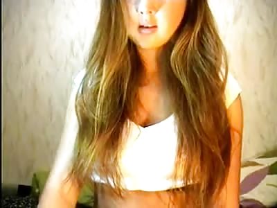 Young brunette shows off on webcam