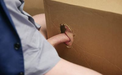 Bride to be sucks cock through shipping box hole