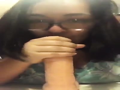 my wife sucking on a huge 9 inch dildo